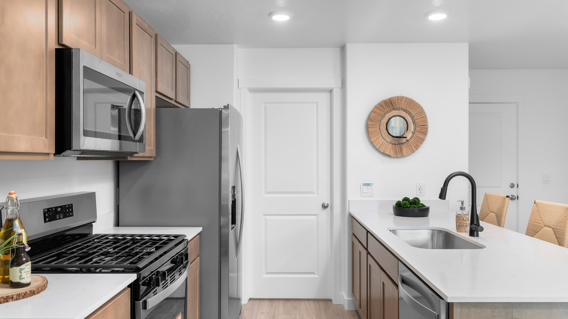 Kitchen with stainless steel appliances.