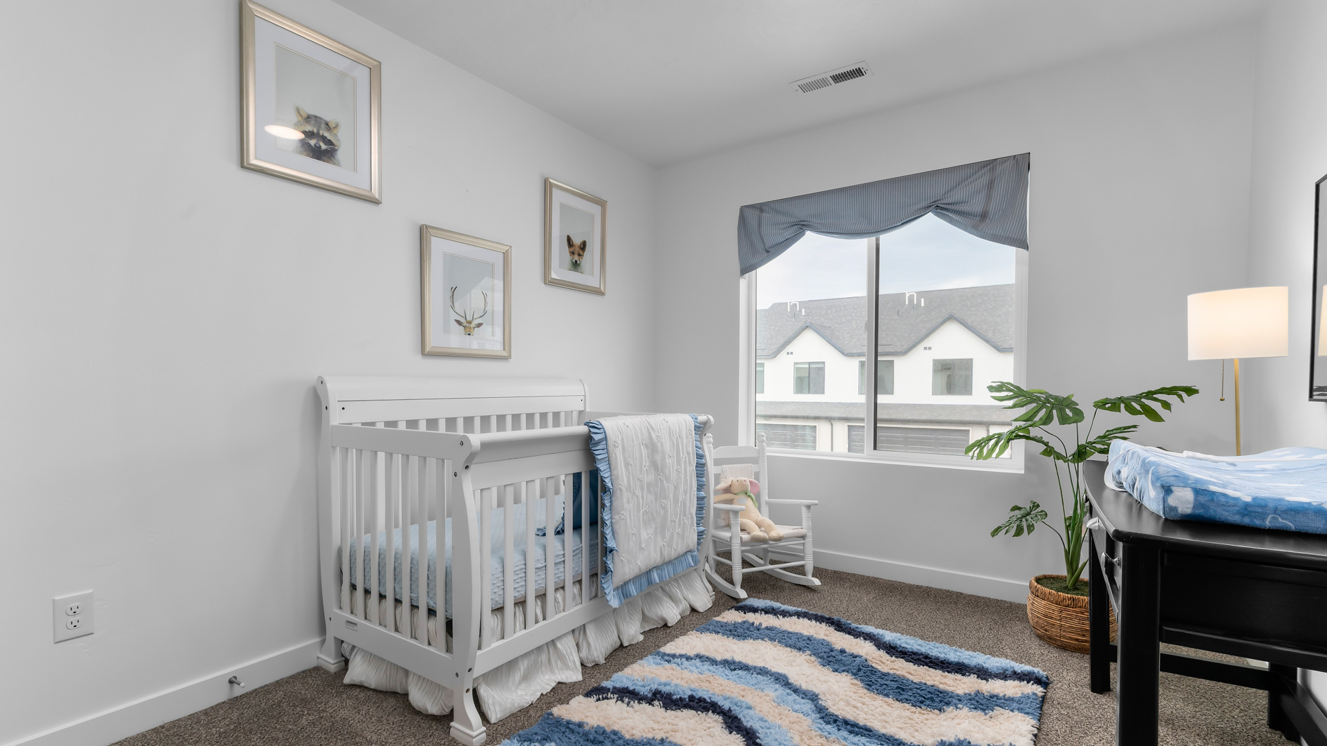 Bedroom with large window.
