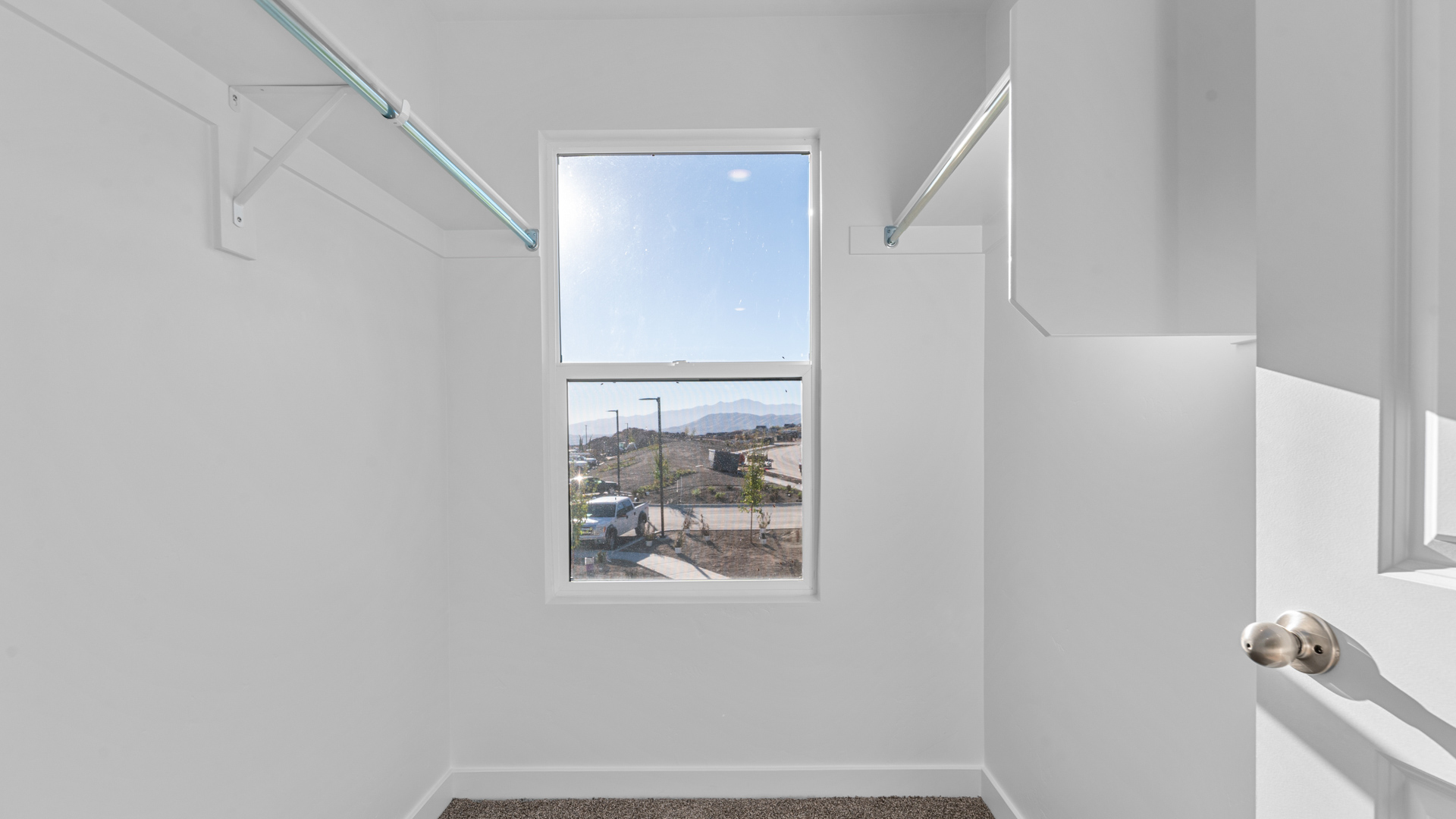 Walk-in closet with window.
