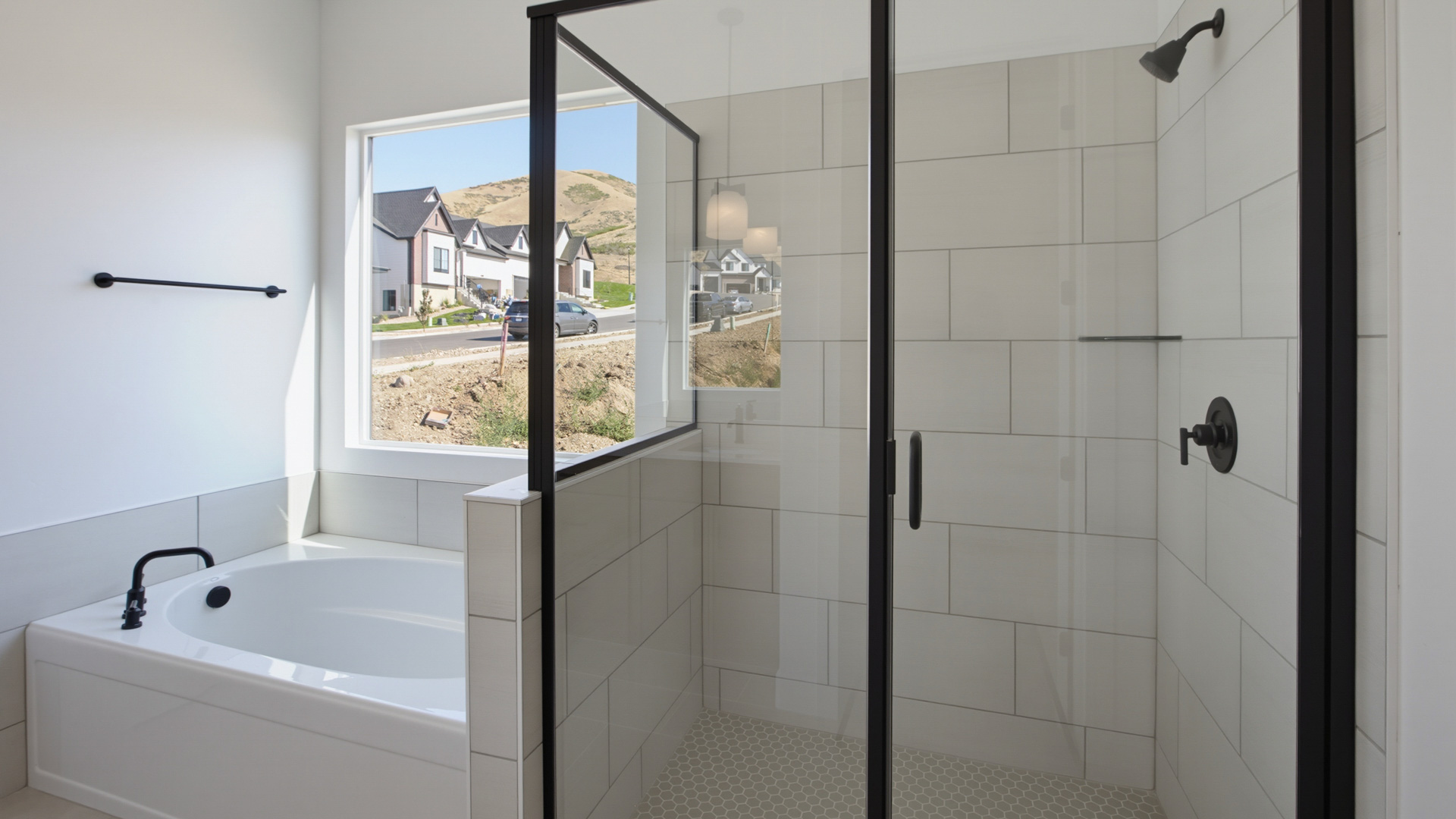 Primary bathroom with double sink vanity.