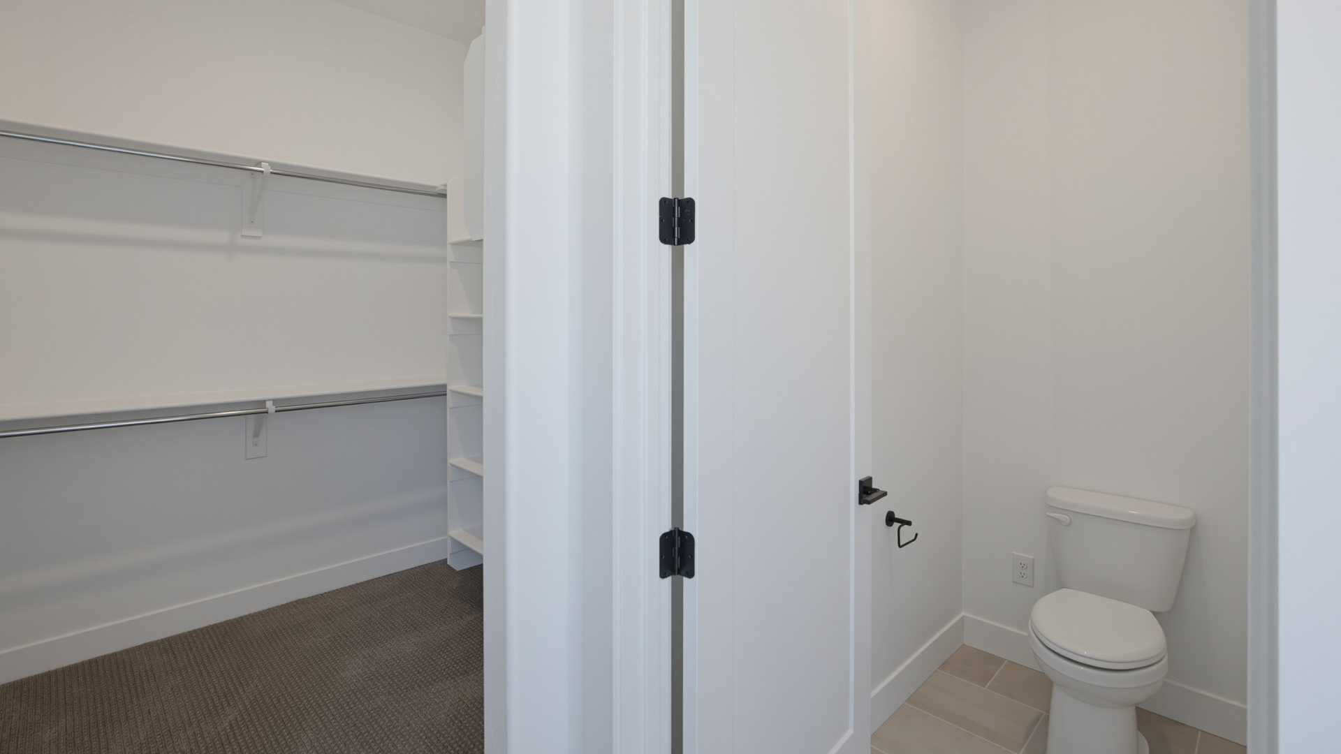Primary bathroom with double sink vanity.
