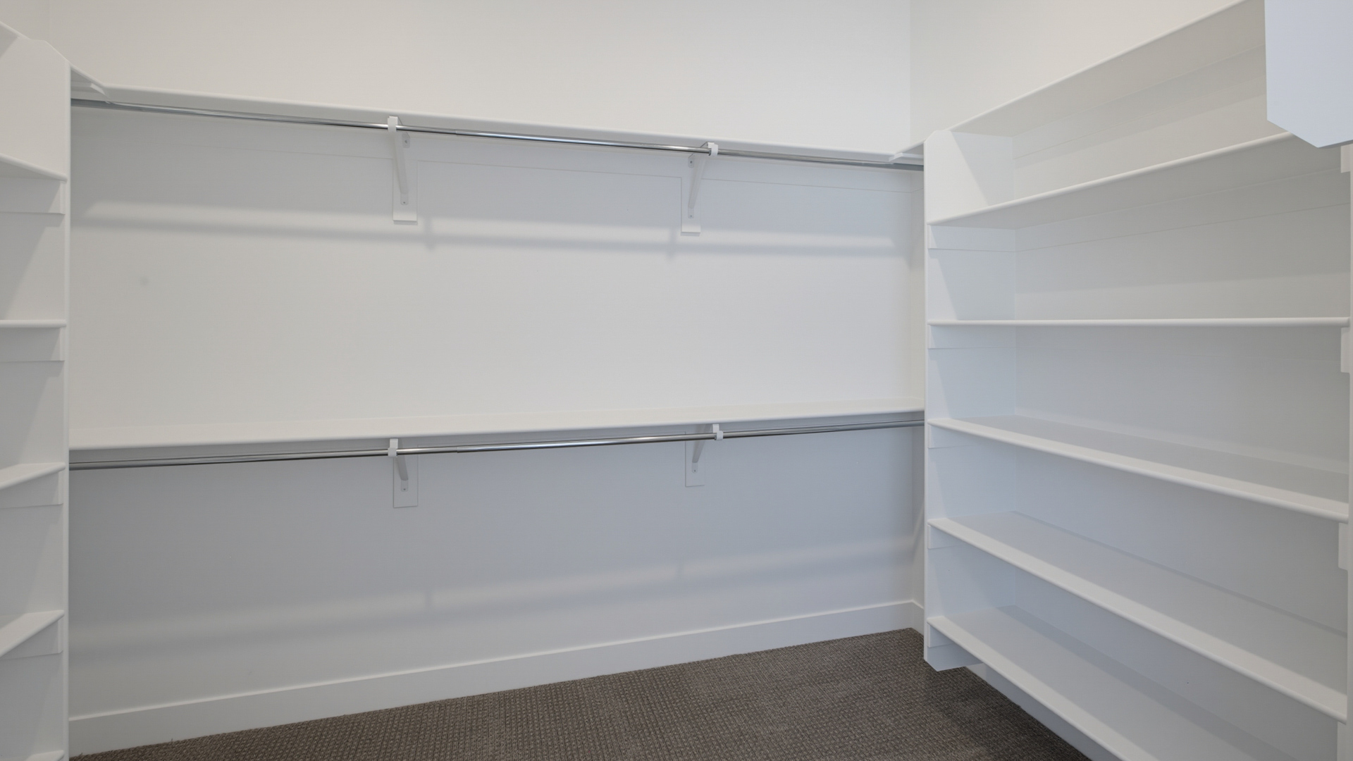 Primary walk-in closet.