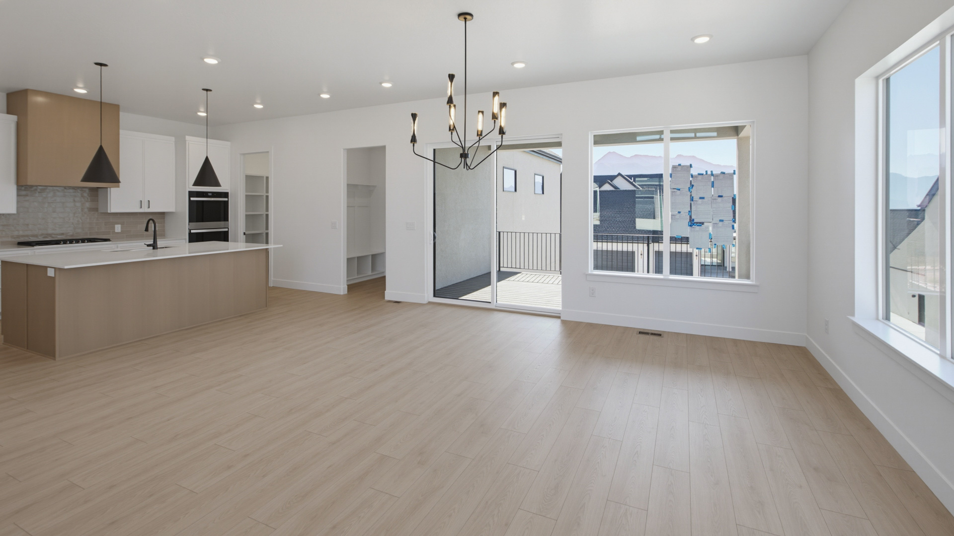 Family room, dining, and kitchen space.