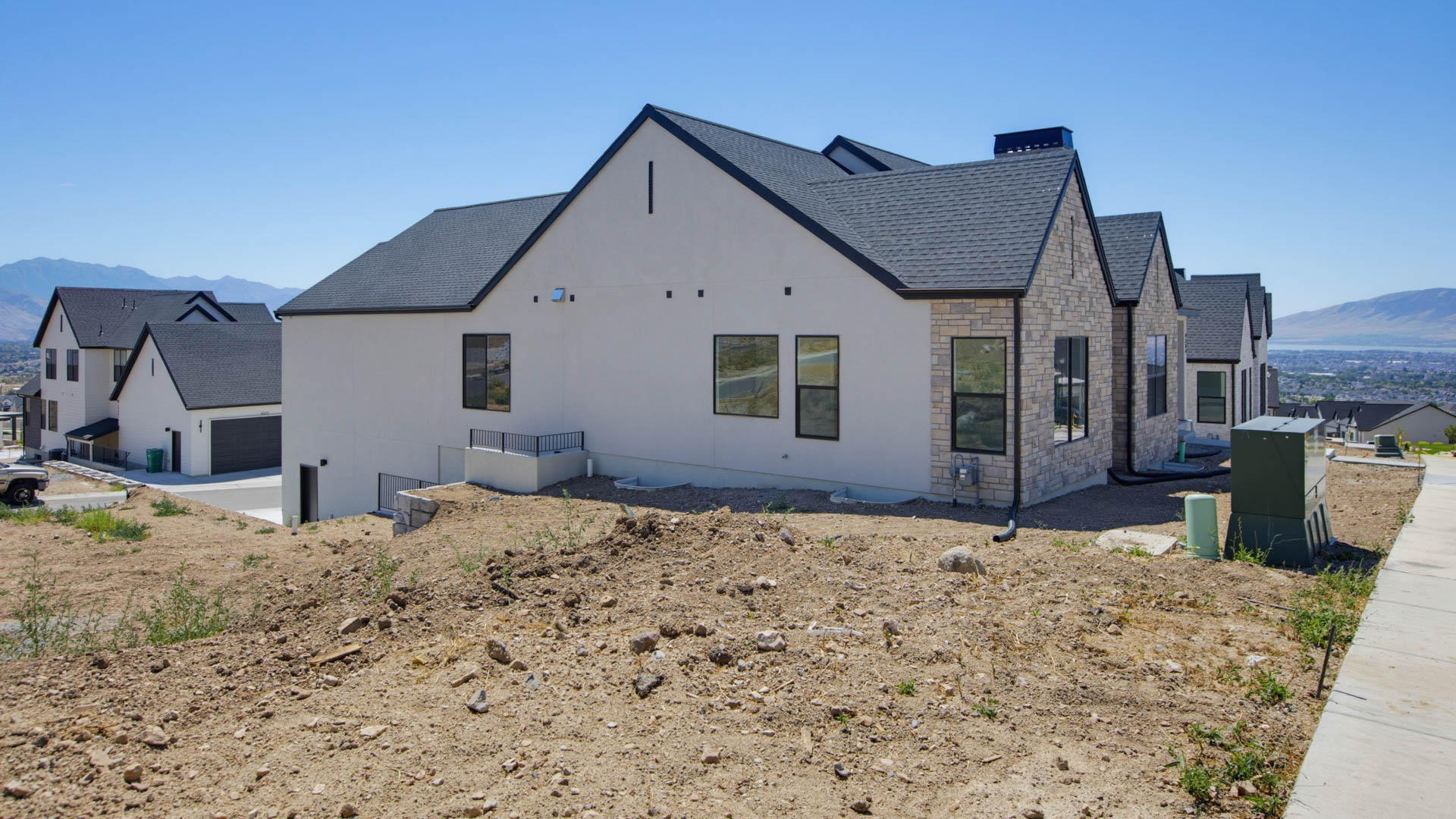 Back of home with garage.