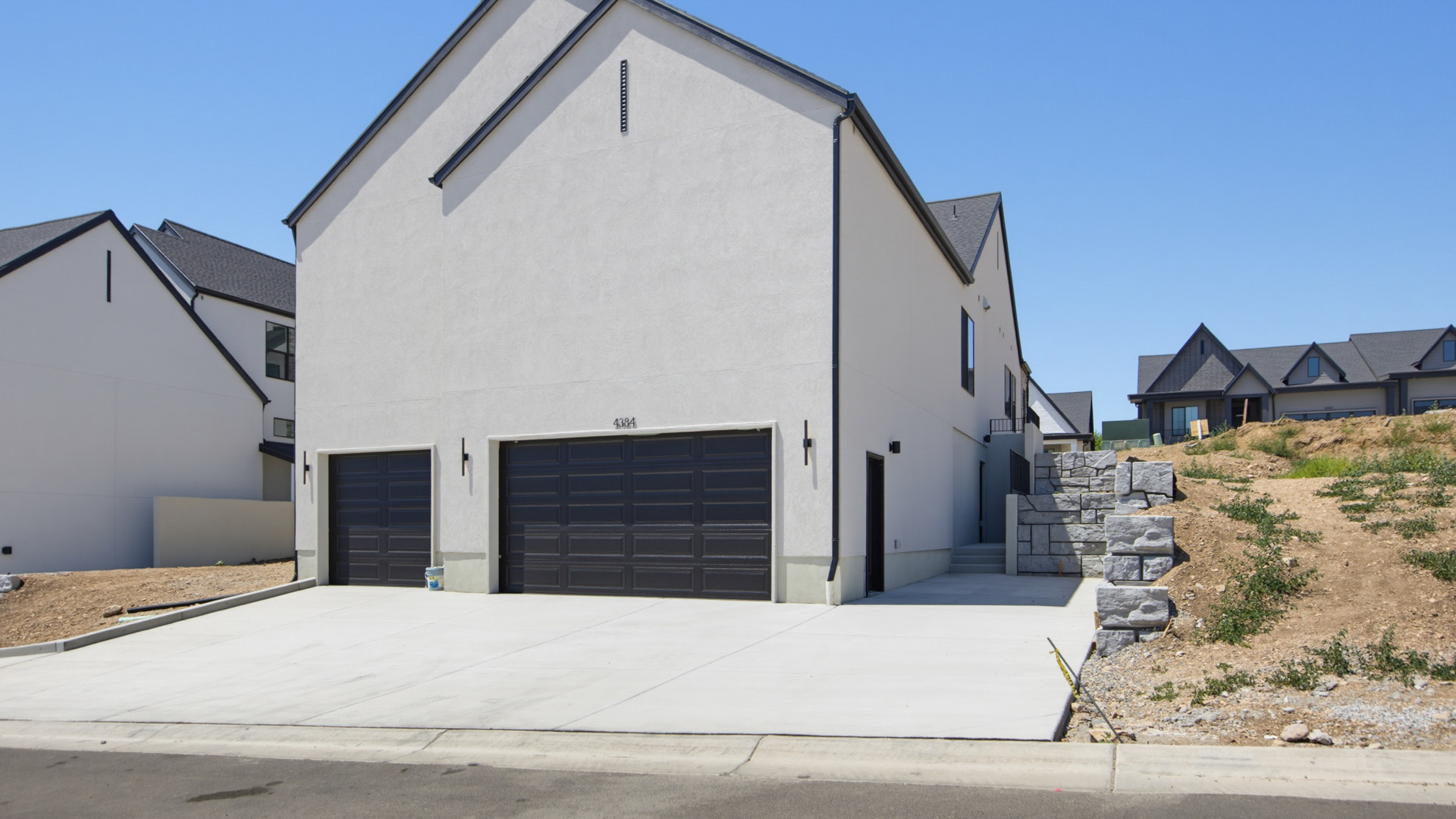 Back of home with garage.