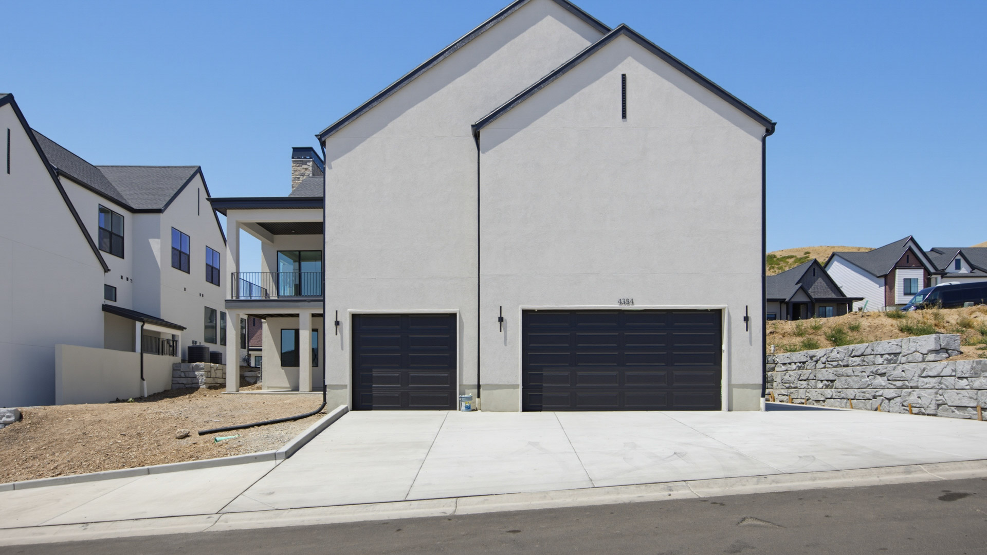 Back of home with garage.