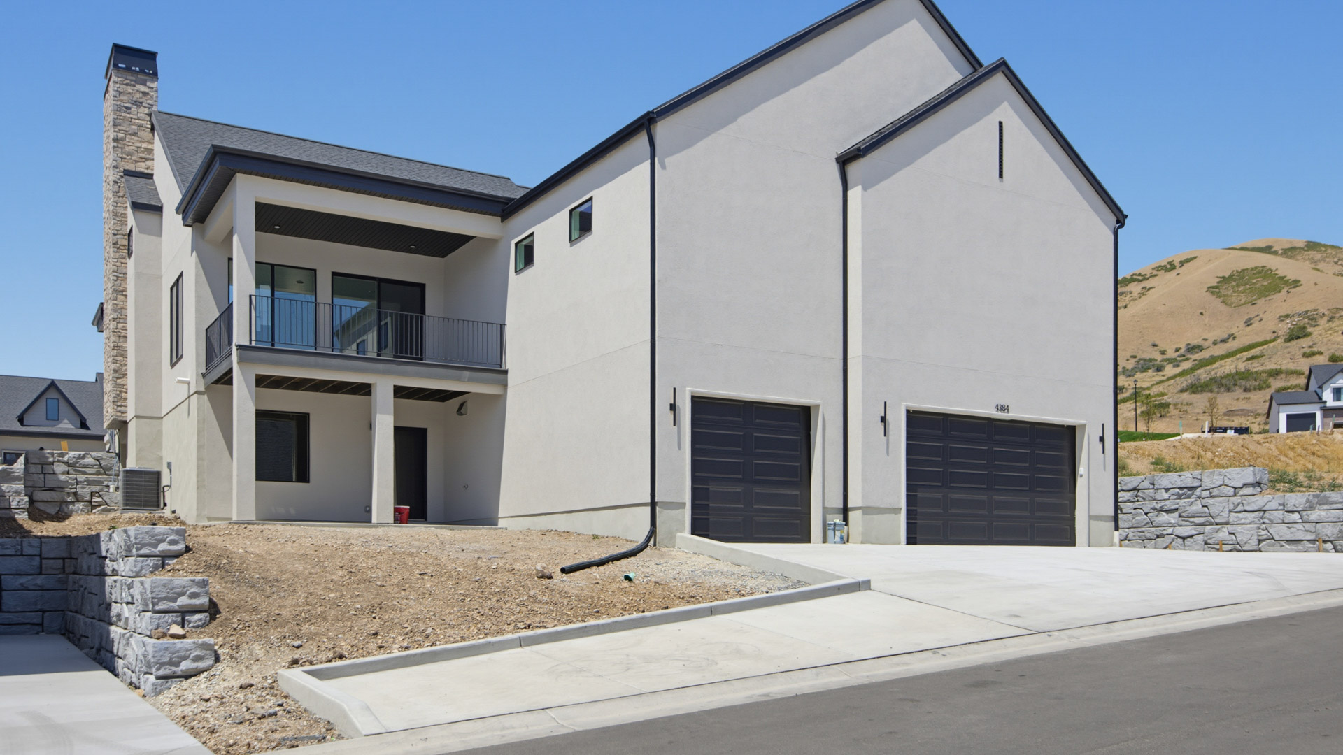 Back of home with garage.