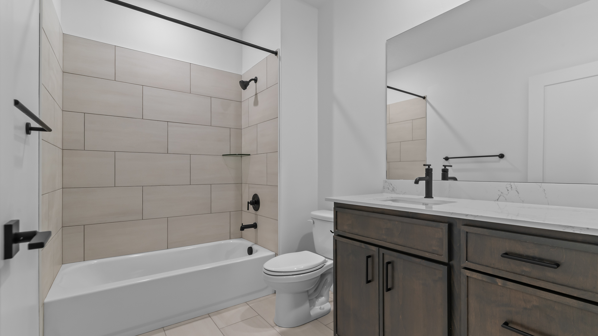 Basement bathroom with vanity.