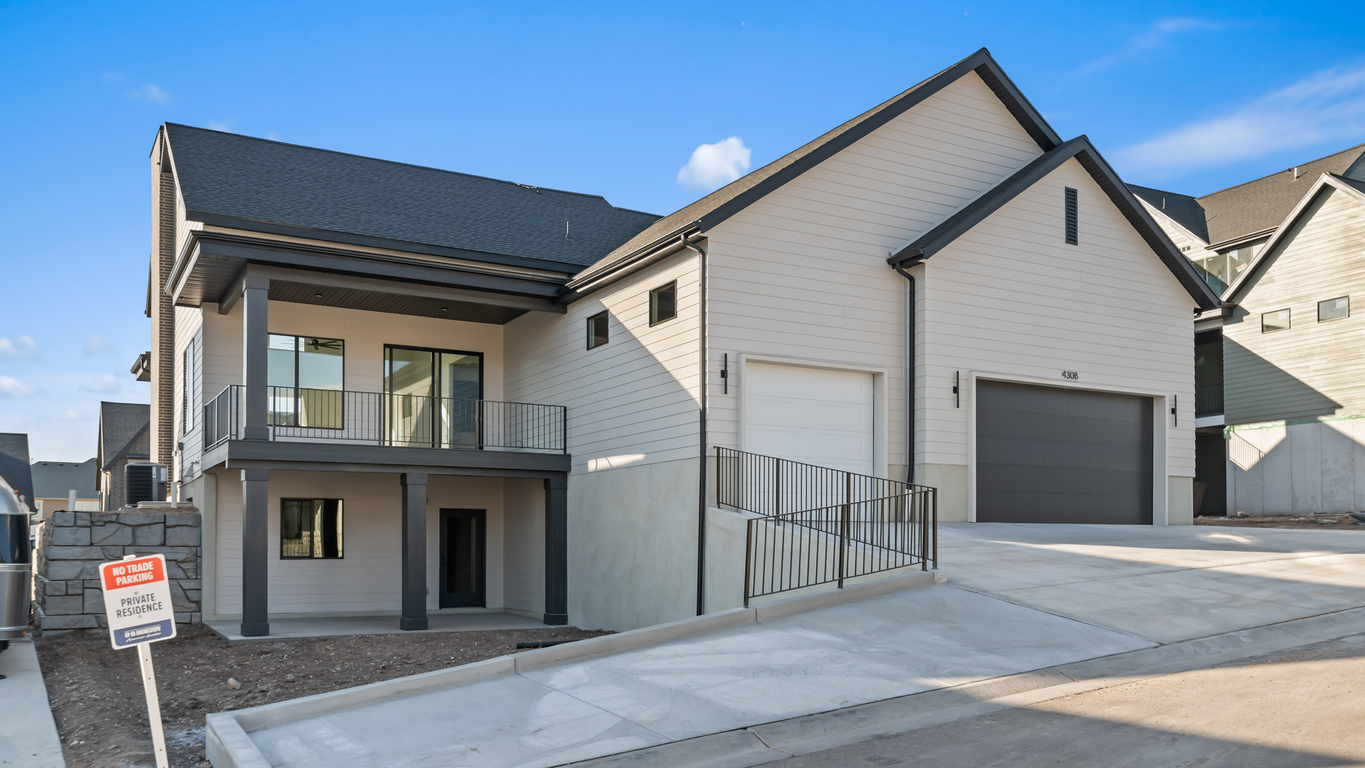 Back of home with garage.