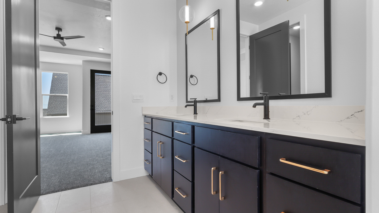 Primary bathroom with double sink vanity.