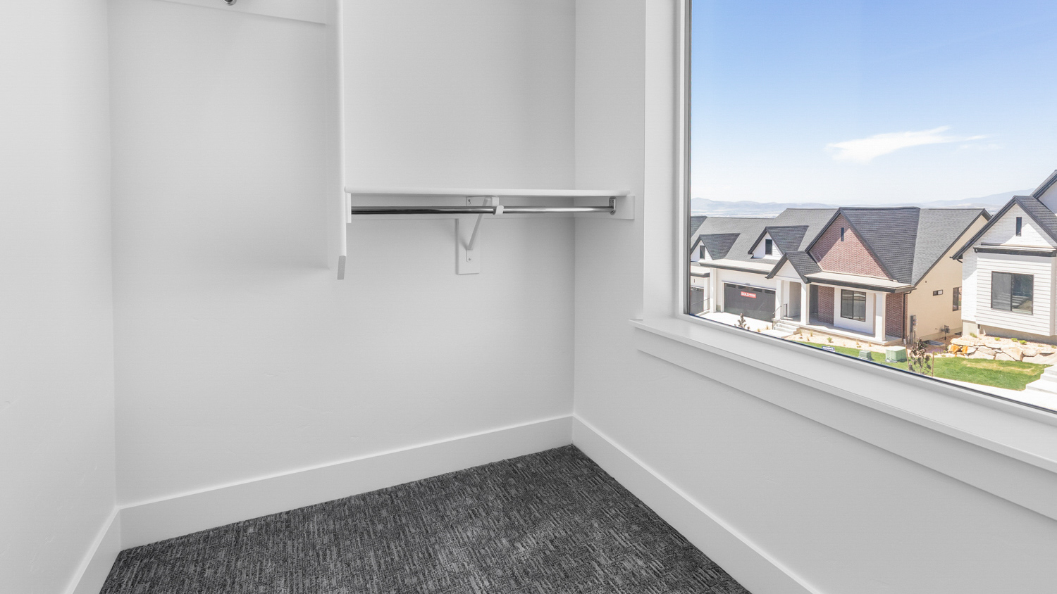 Walk-in closet with window.