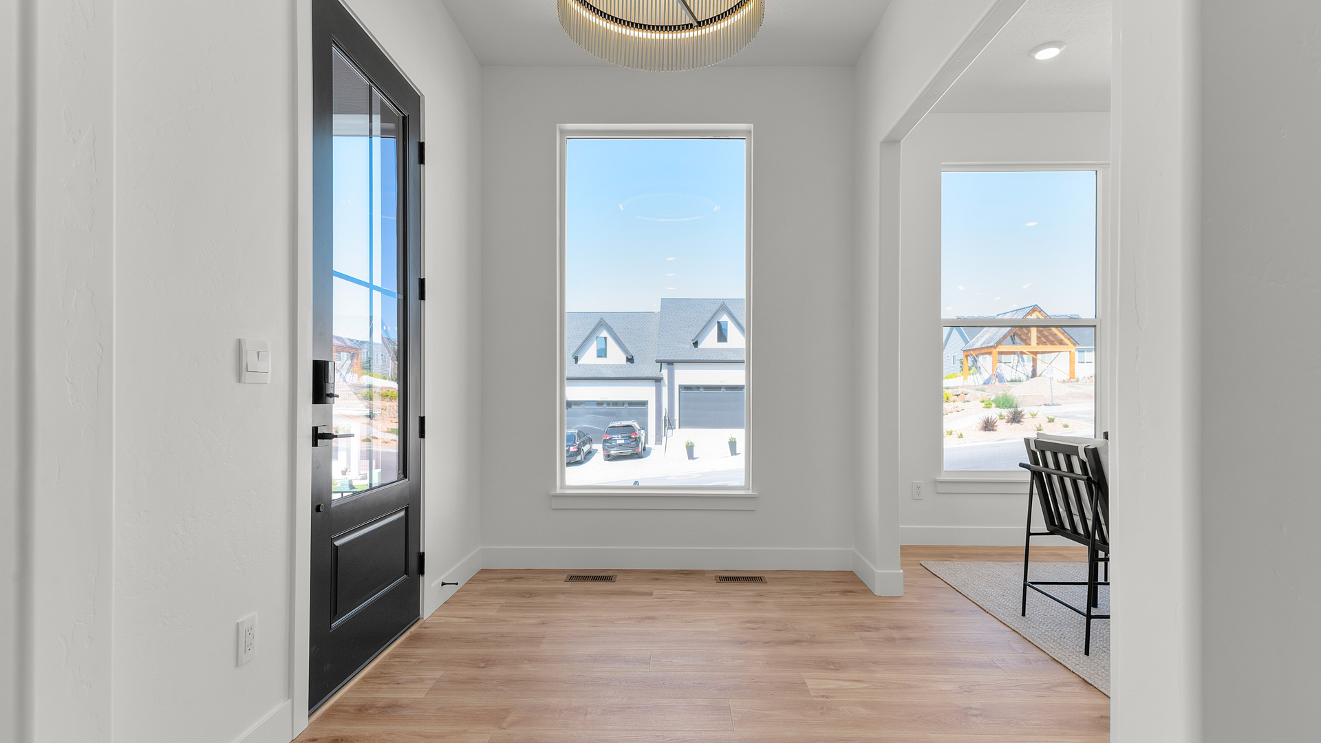Entryway with large window into main living space.