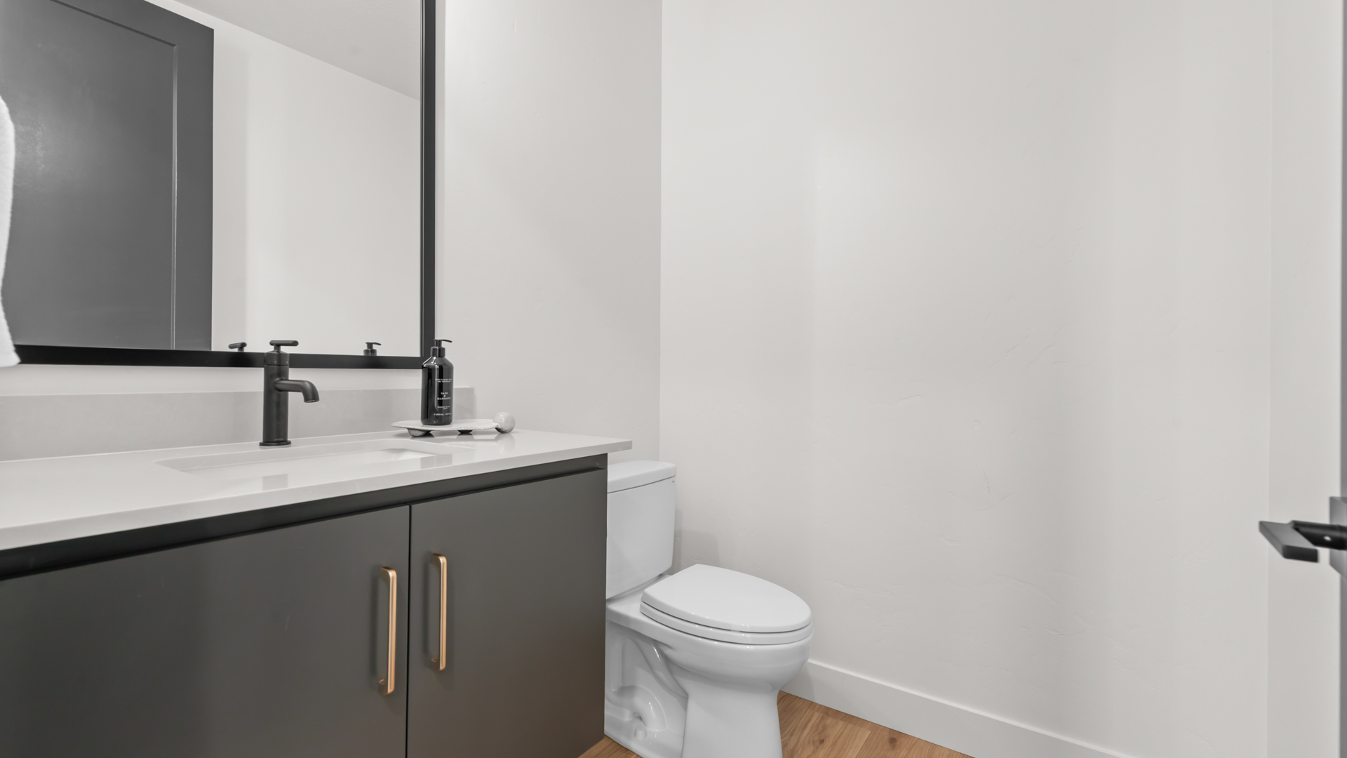 Powder bathroom with vanity.