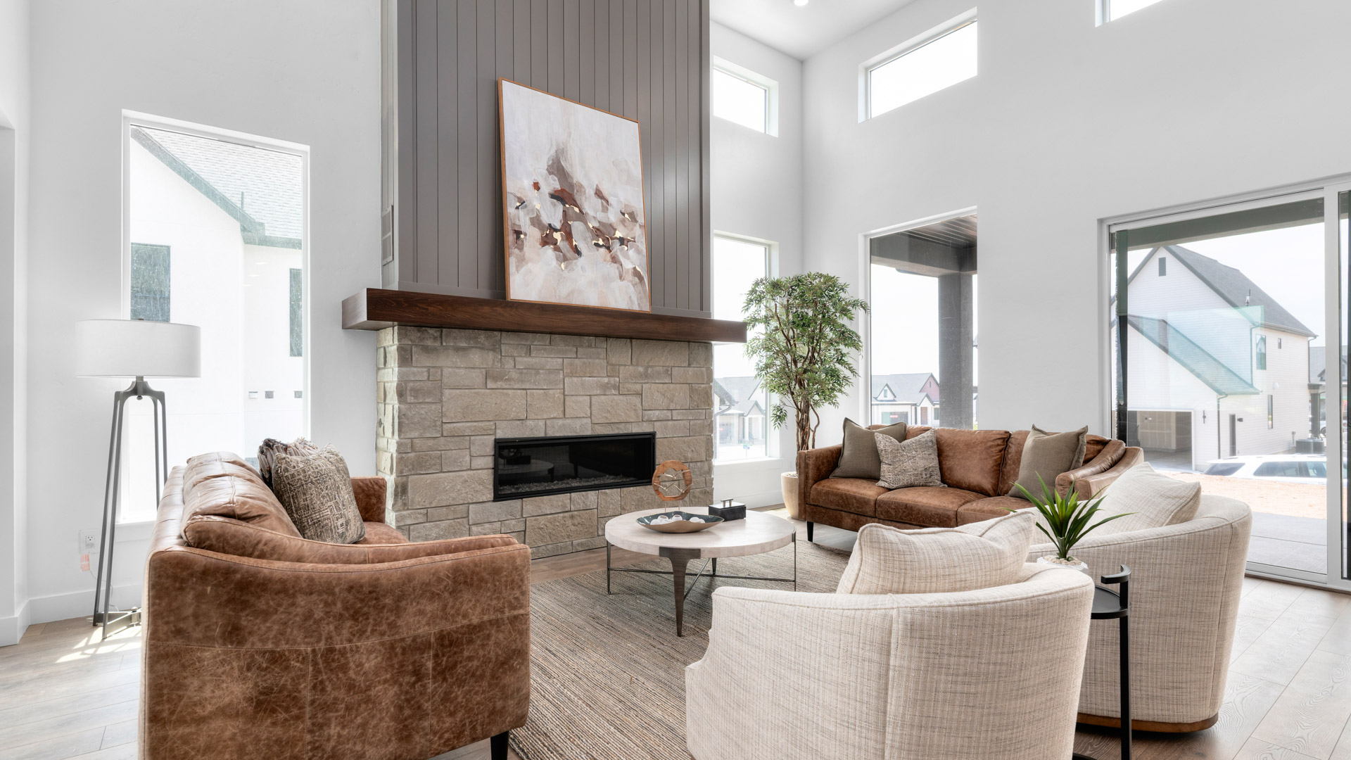 Family room with fireplace and windows.