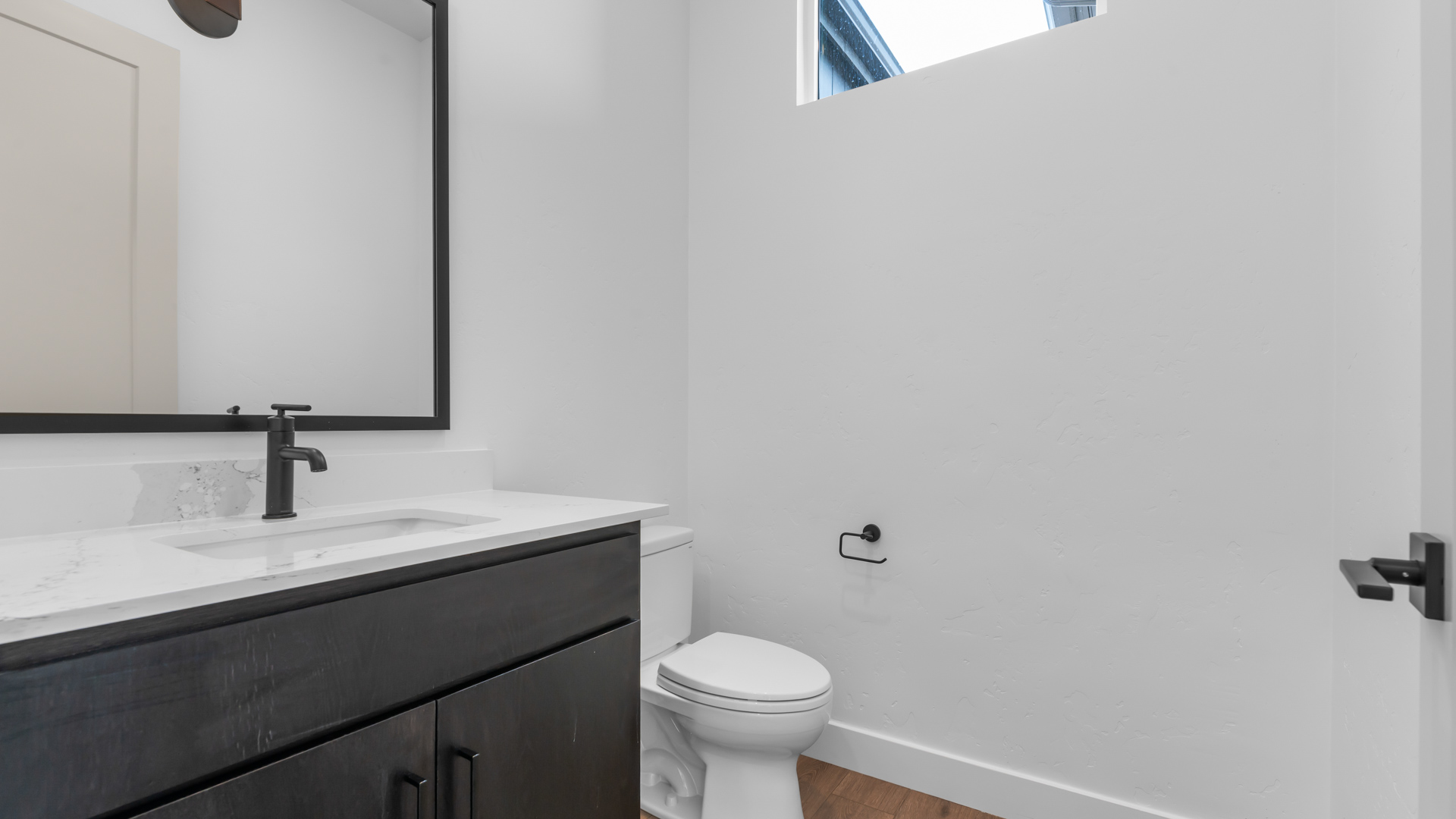 Powder bathroom with vanity.