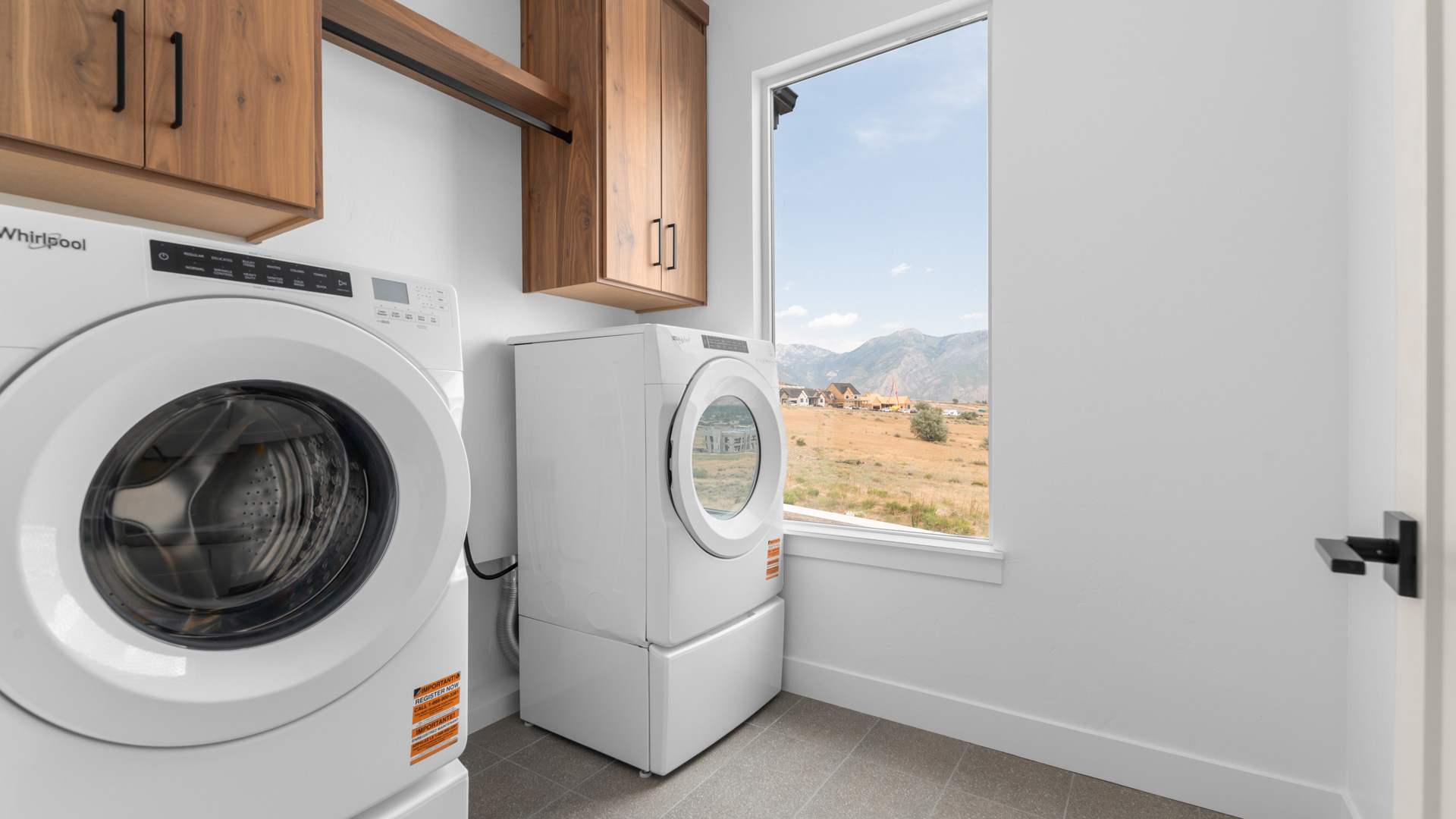 Upstairs laundry room with window