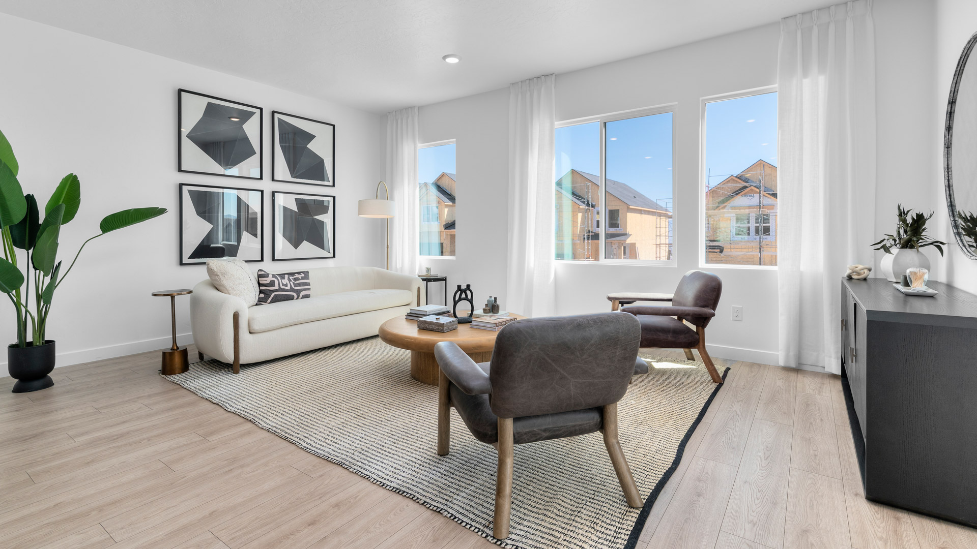 Spacious family room with windows.