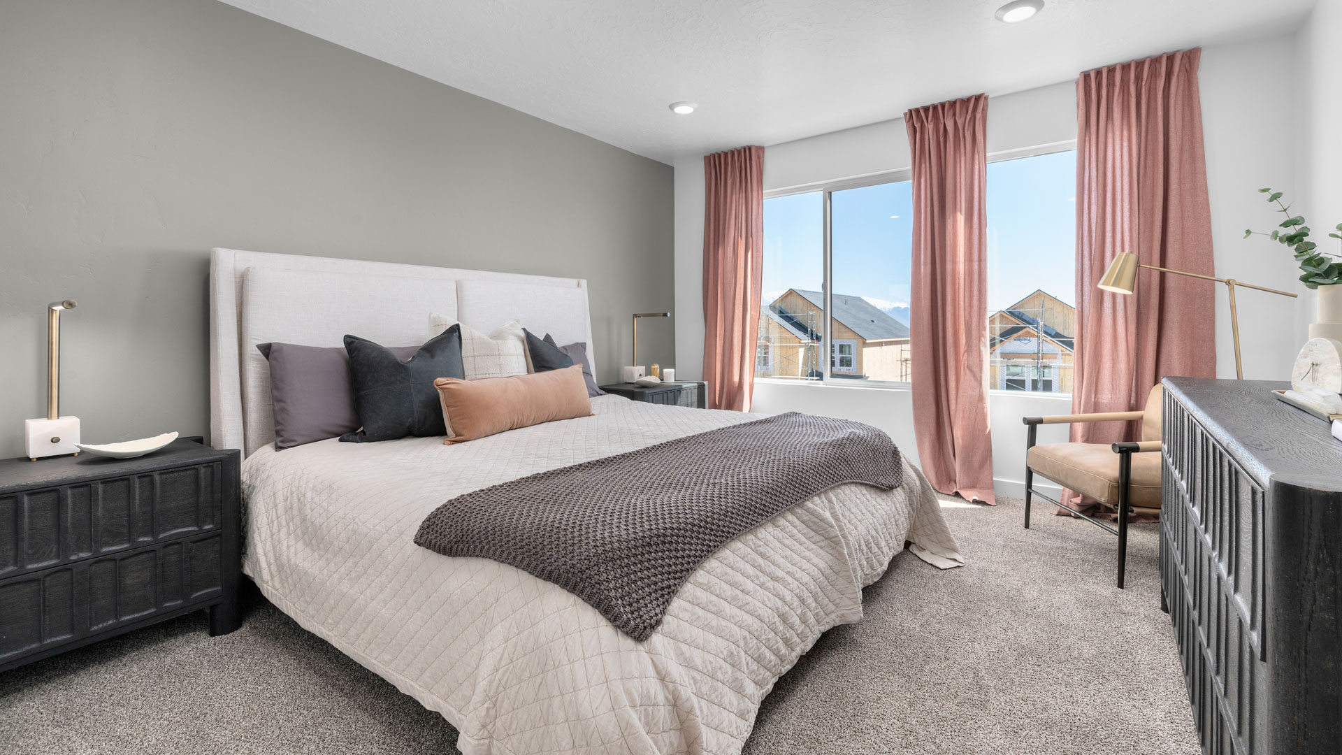 Primary bedroom with windows.