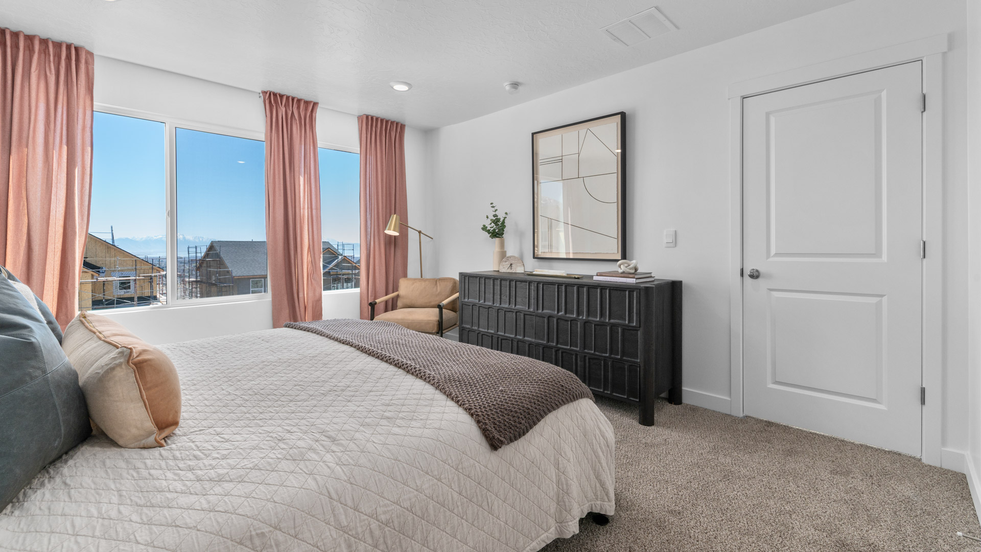 Primary bedroom with windows.