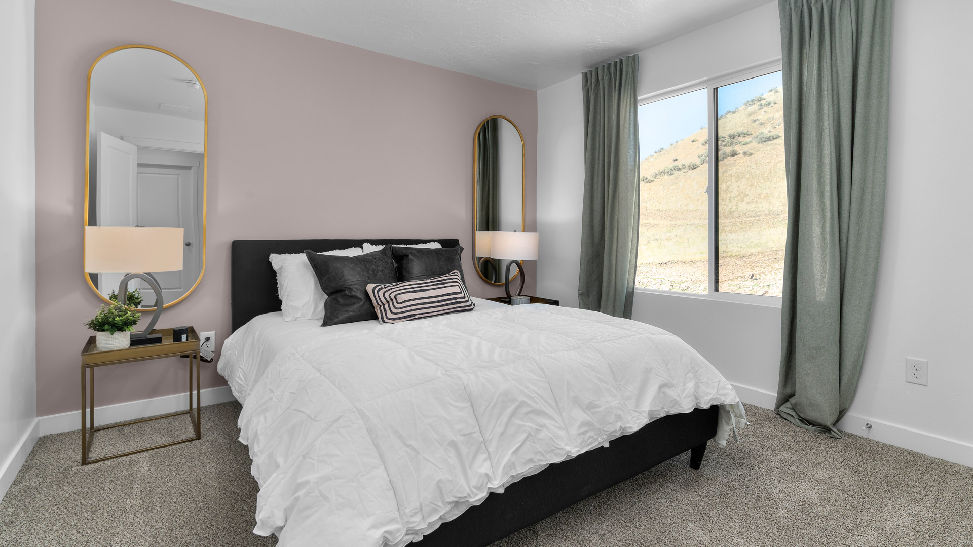 Bedroom with large window.