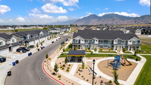 Amenities include a playground for children to play.