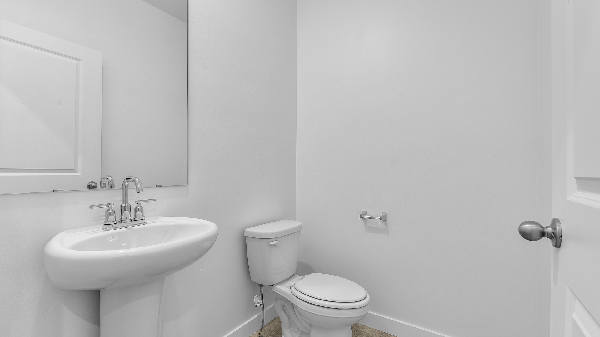 Powder bath with pedestal sink.