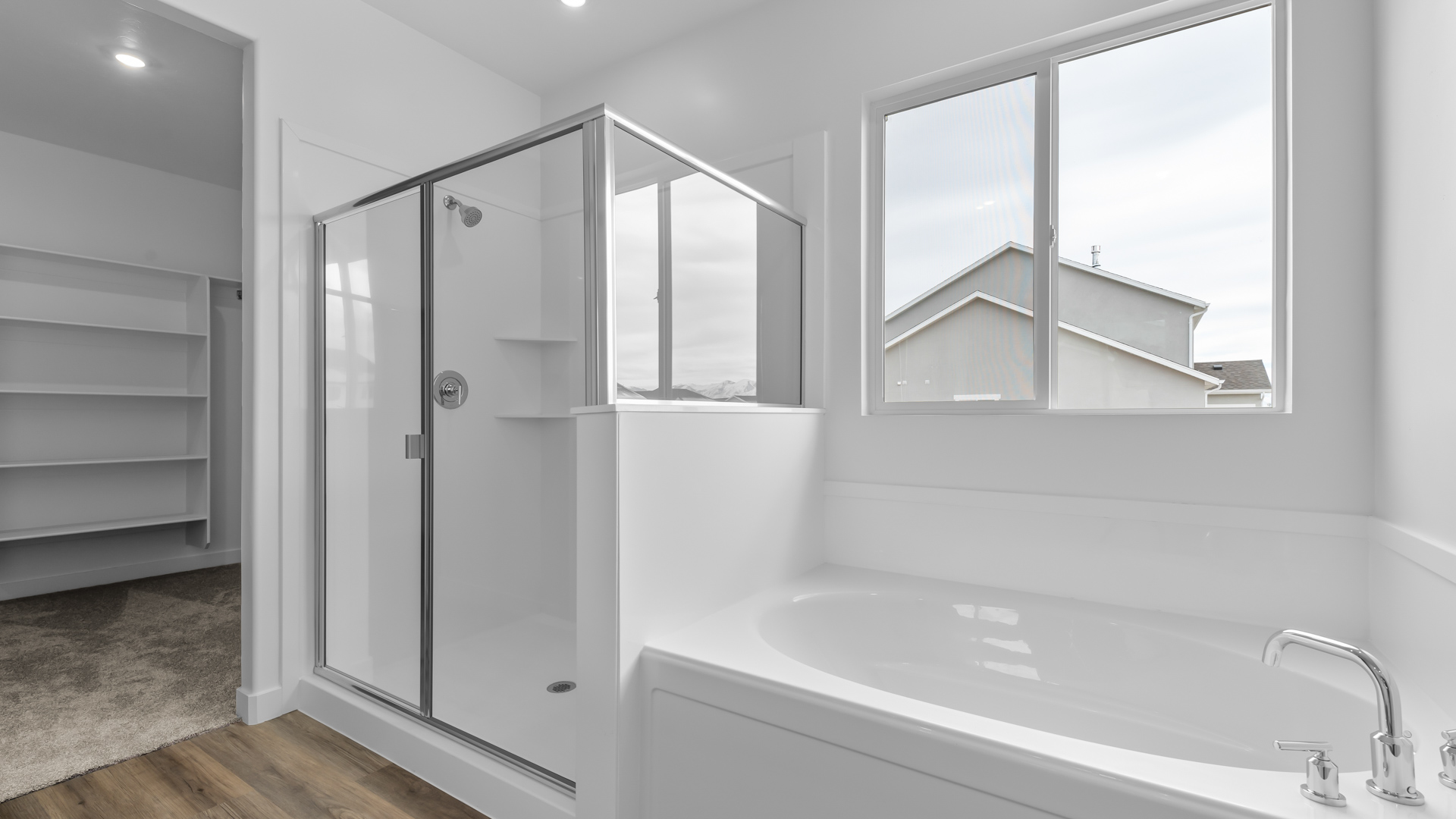 Large bath and shower with window.