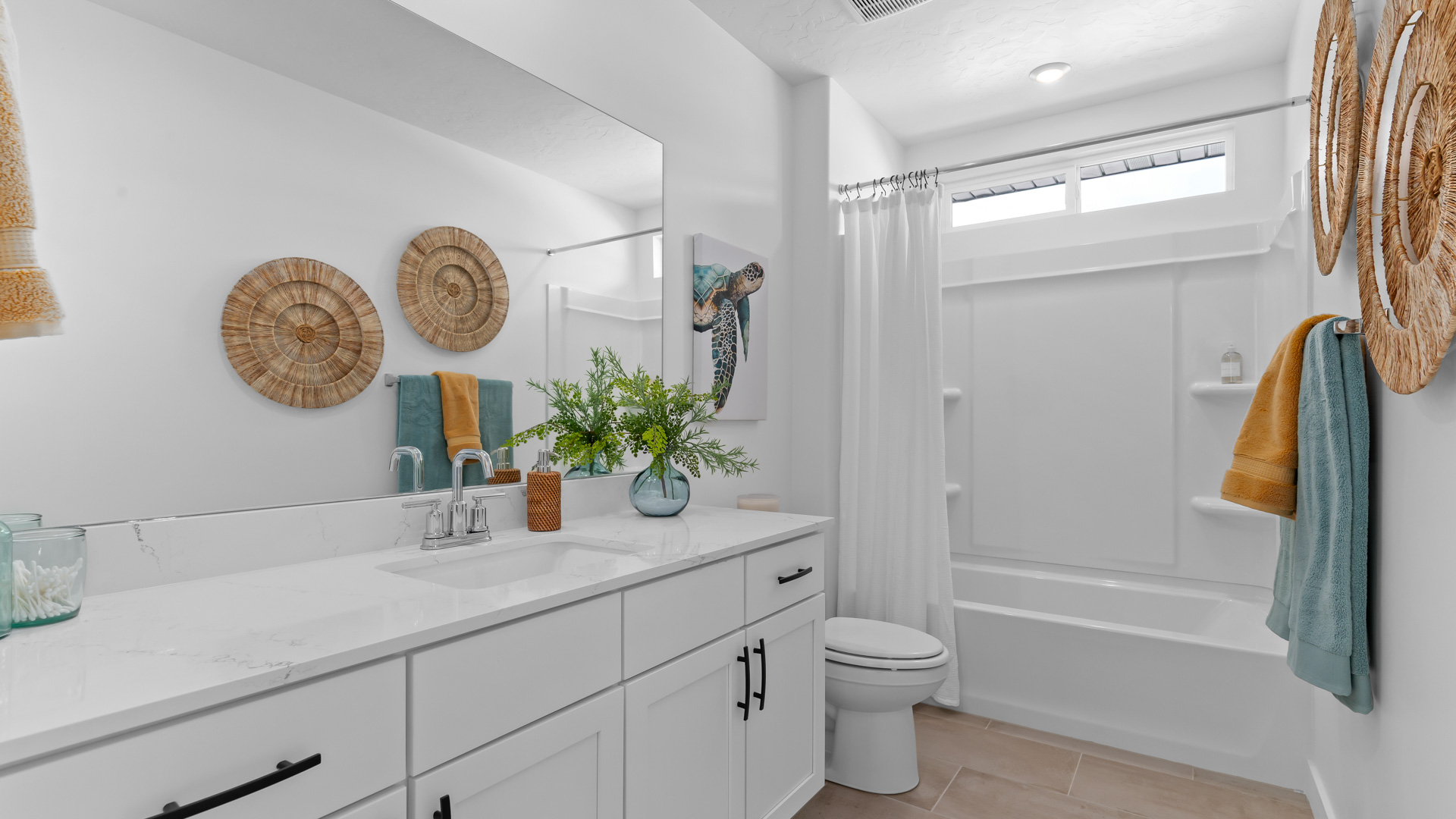 Bathroom with shower surround and window above.