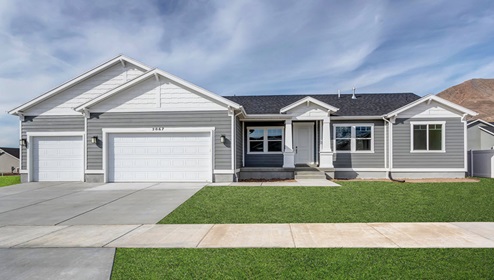 Brand new single story home in Grantsville with a three car garage