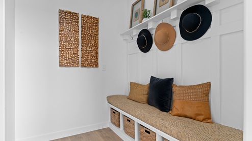 Mudroom space with storage.
