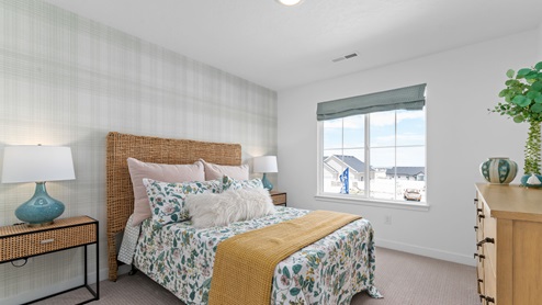 Bedroom with large window.
