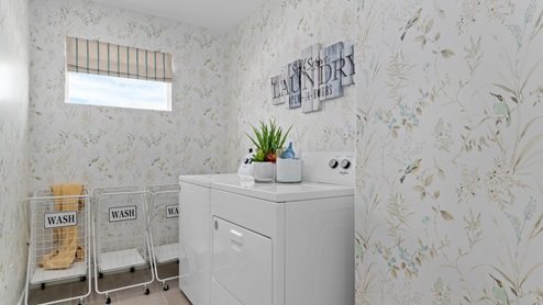 Laundry room with window.