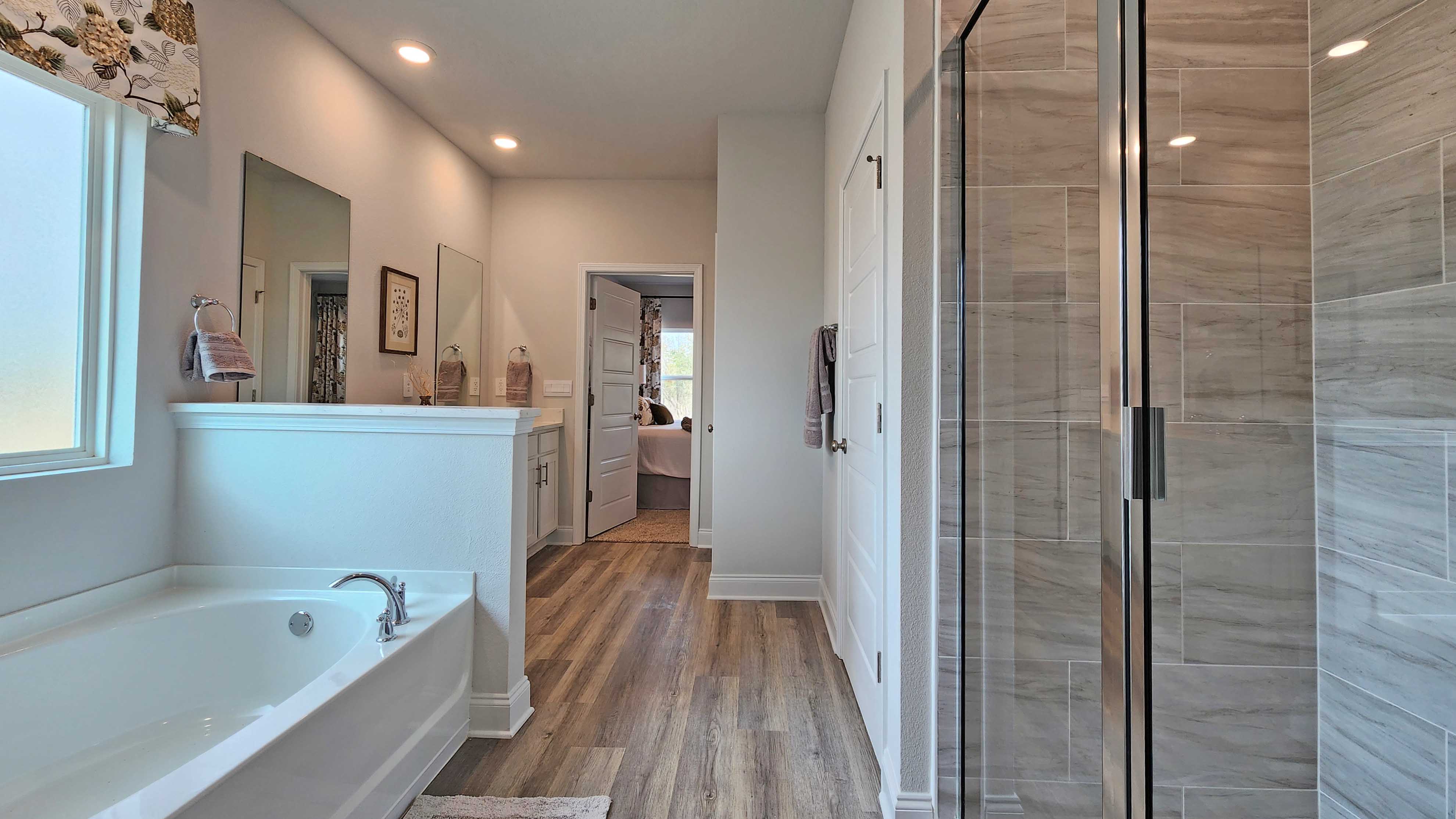 Bathroom with tub and shower