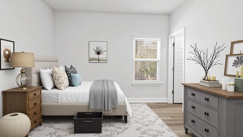 Spacious guest bedroom with luxurious decor.