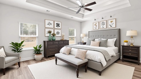Spacious and luxurious primary bedroom suite.