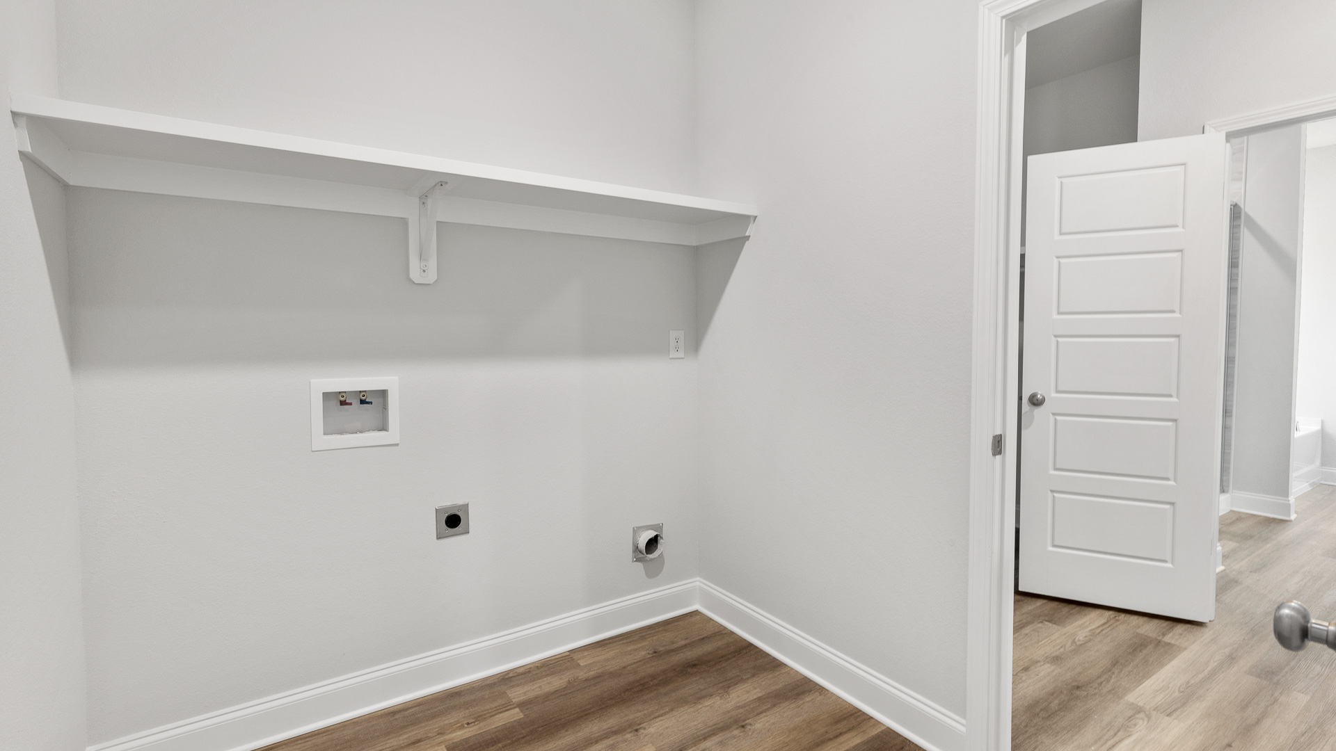 Spacious laundry room inside the Kingston