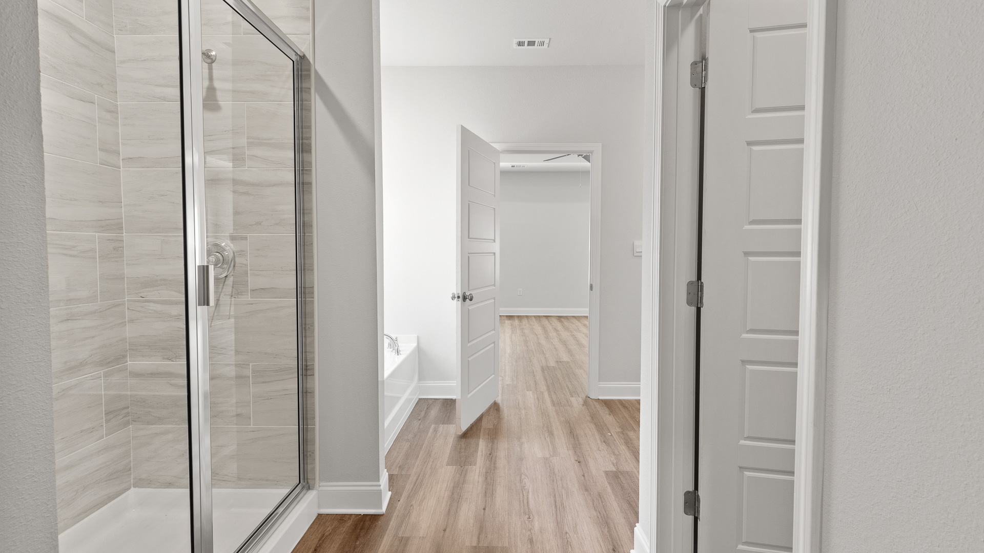 Luxurious and spacious bathroom inside the Primary suite