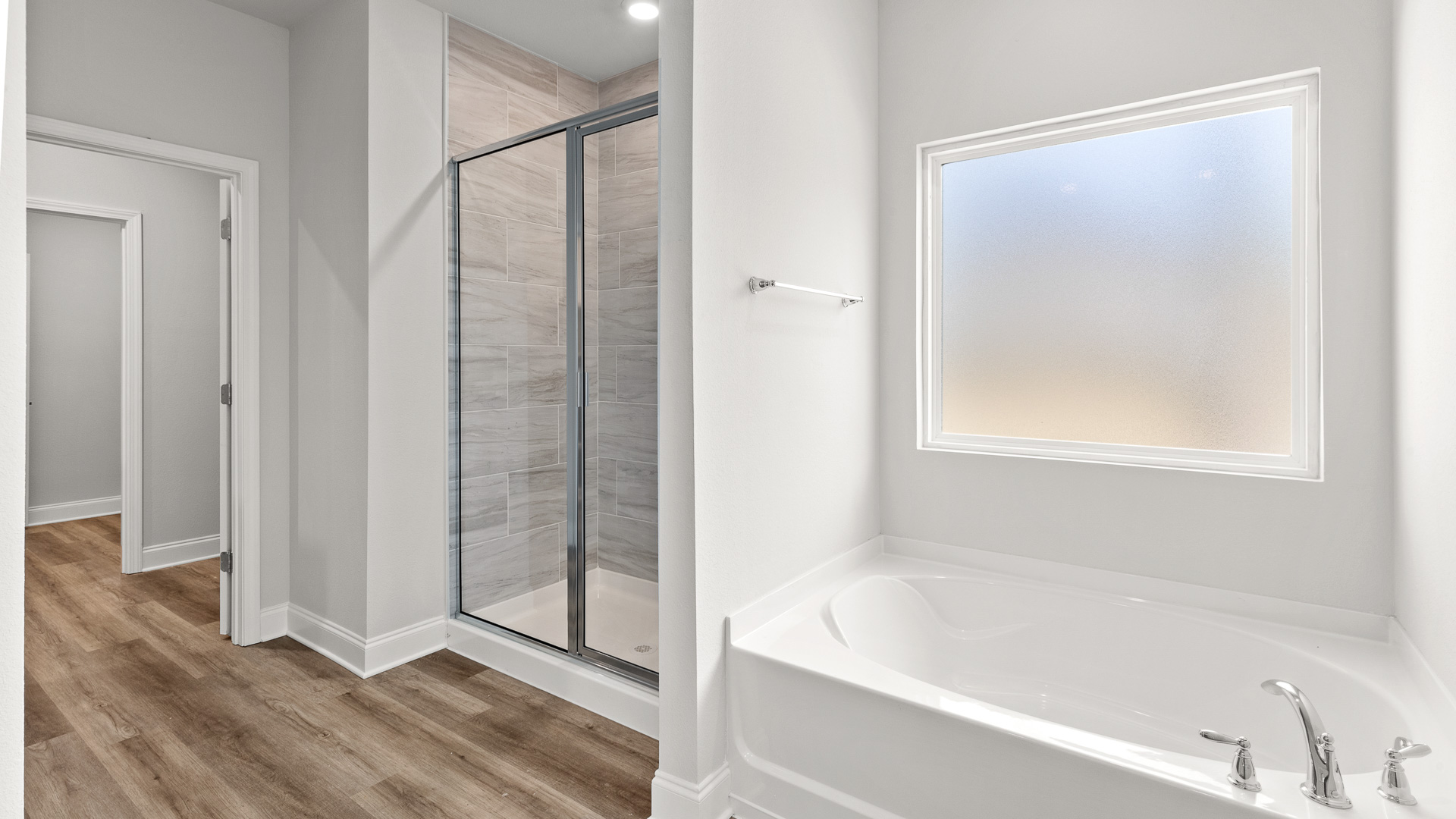 Soaking tub with walk in shower