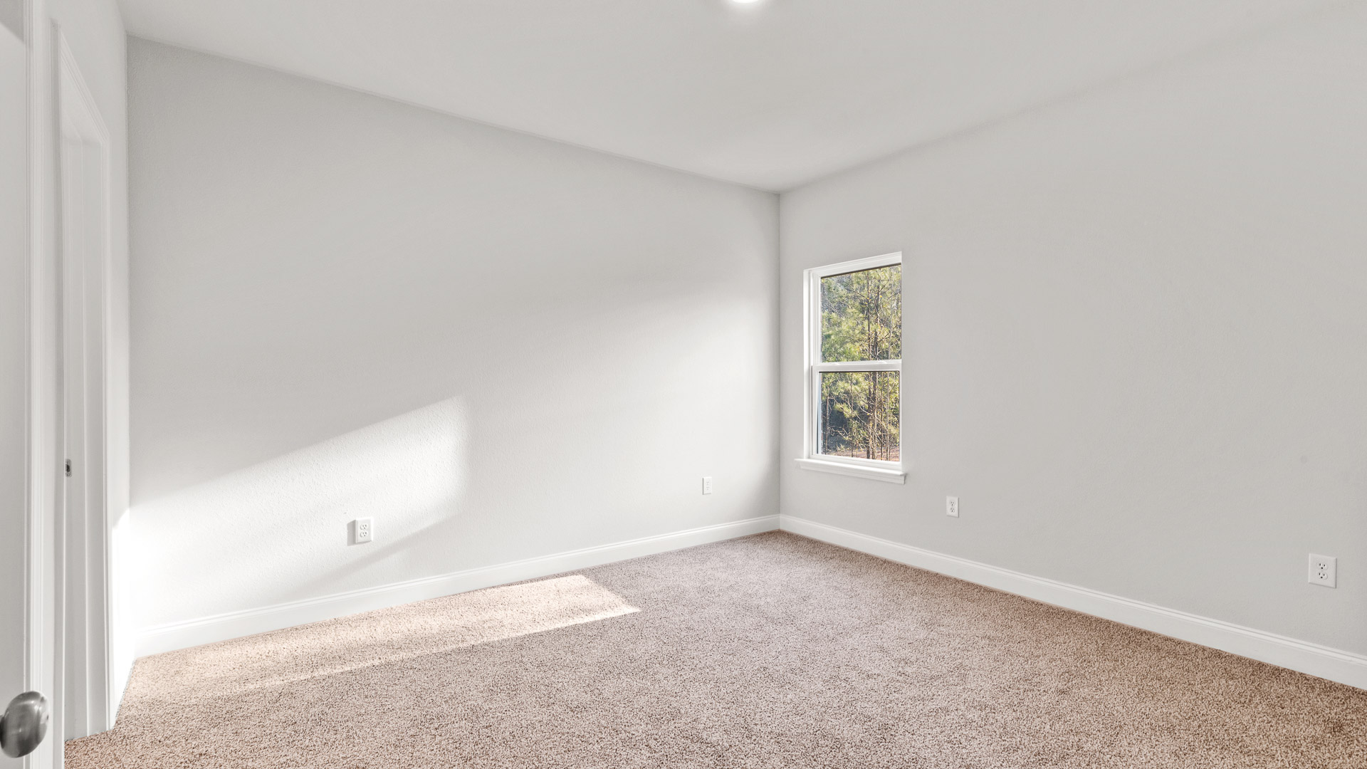 Bright and airy bedroom inside the William