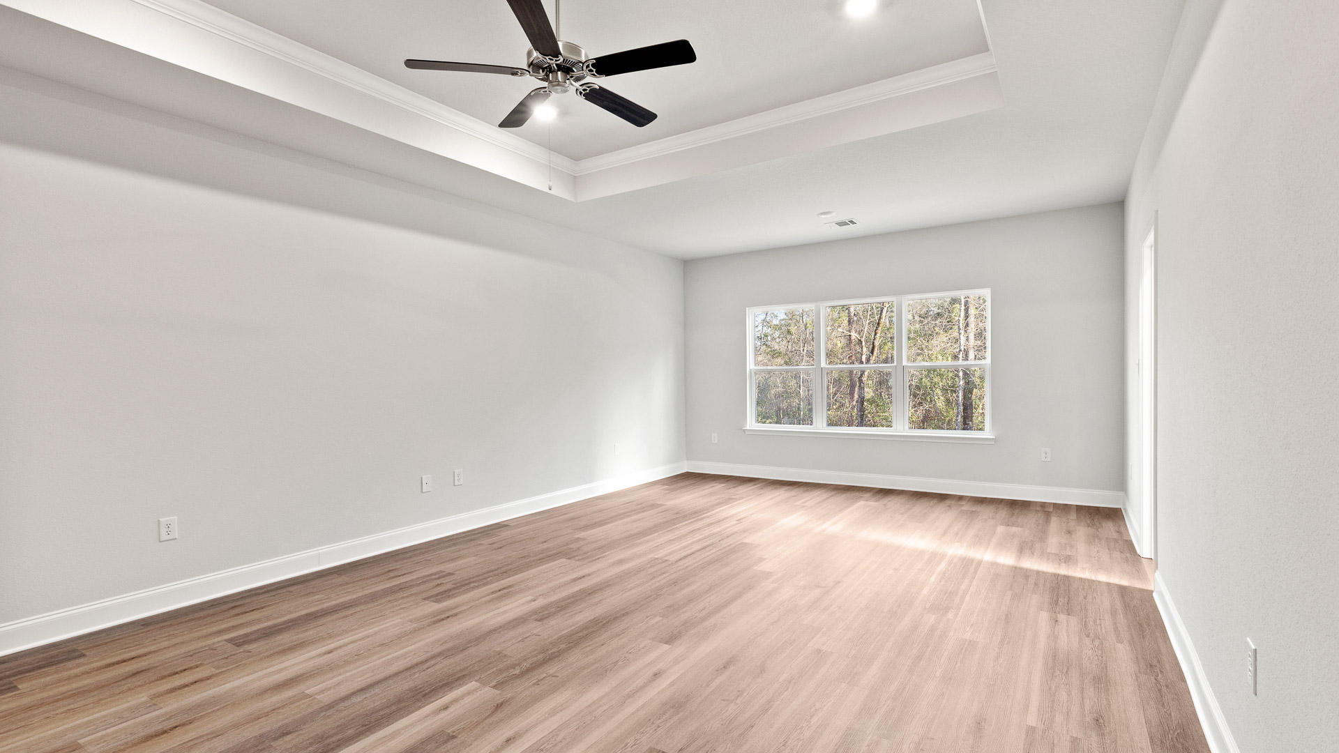 Spacious and bright primary bedroom suite