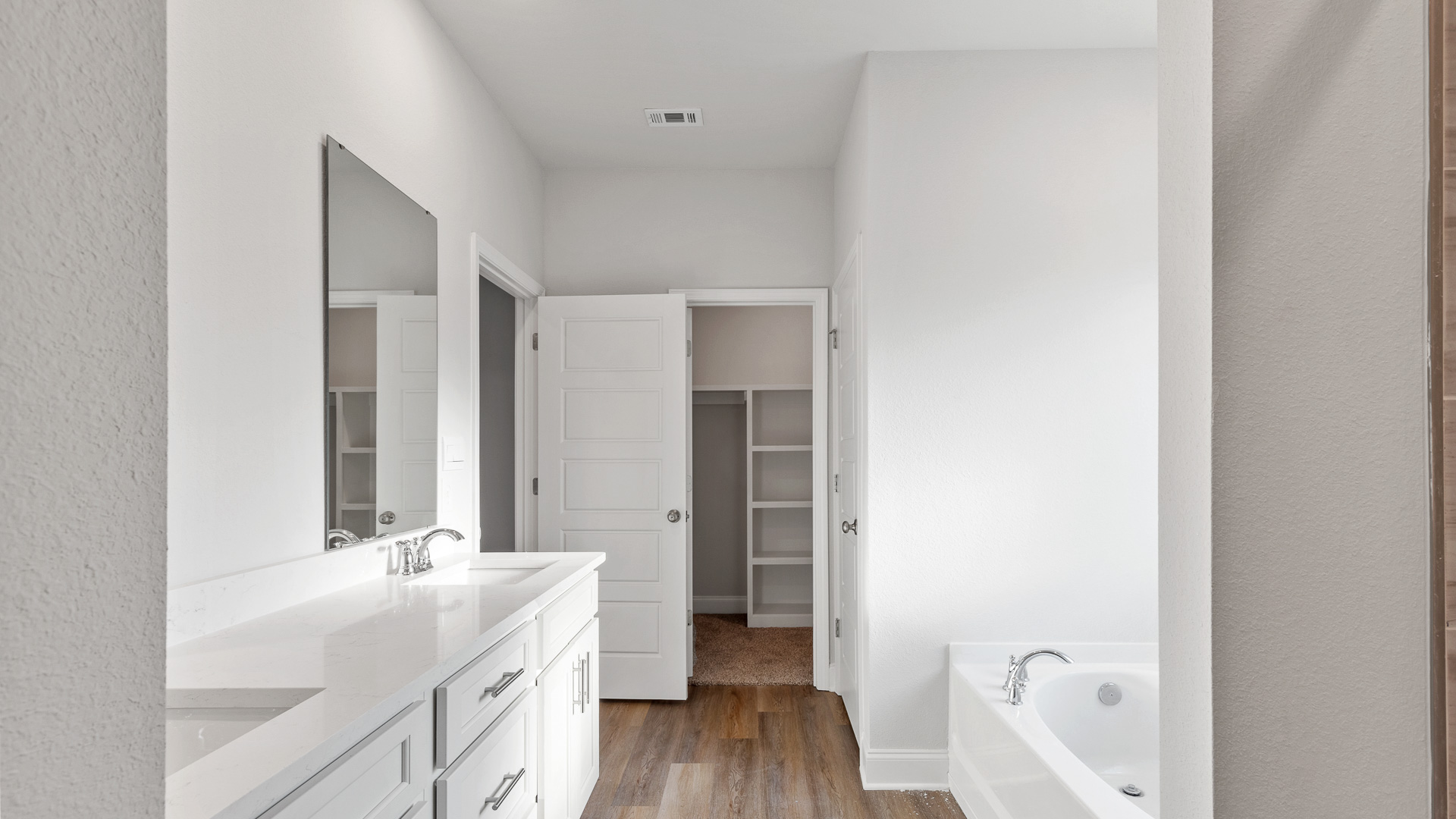 Spacious primary bedroom suite