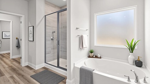 Virtually staged spa like ensuite with window and large soaking tub in Palm Pointe.