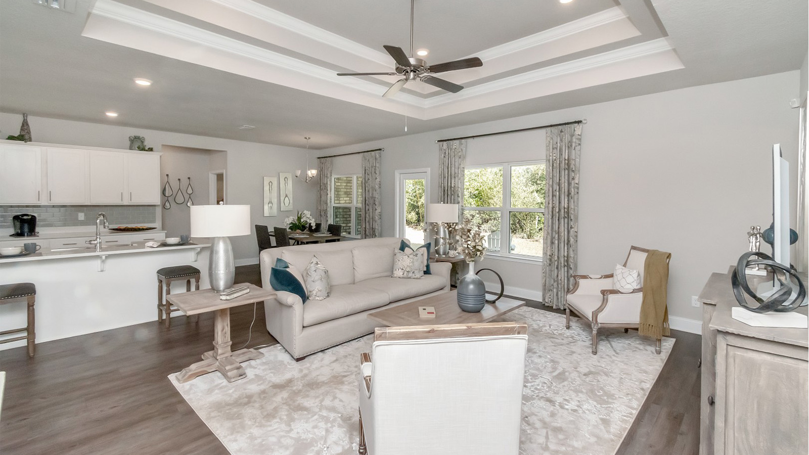 Modern finishes and an open-concept layout bring function and style to this Mississippi Gulf Coast living area.