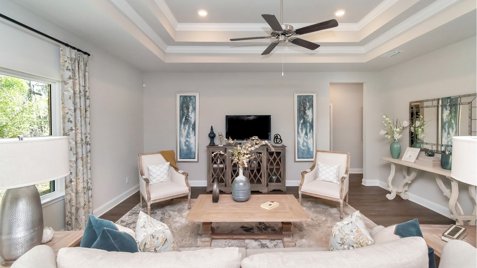 This bright and airy living room showcases coastal charm in a D.R. Horton home in Ocean Springs.