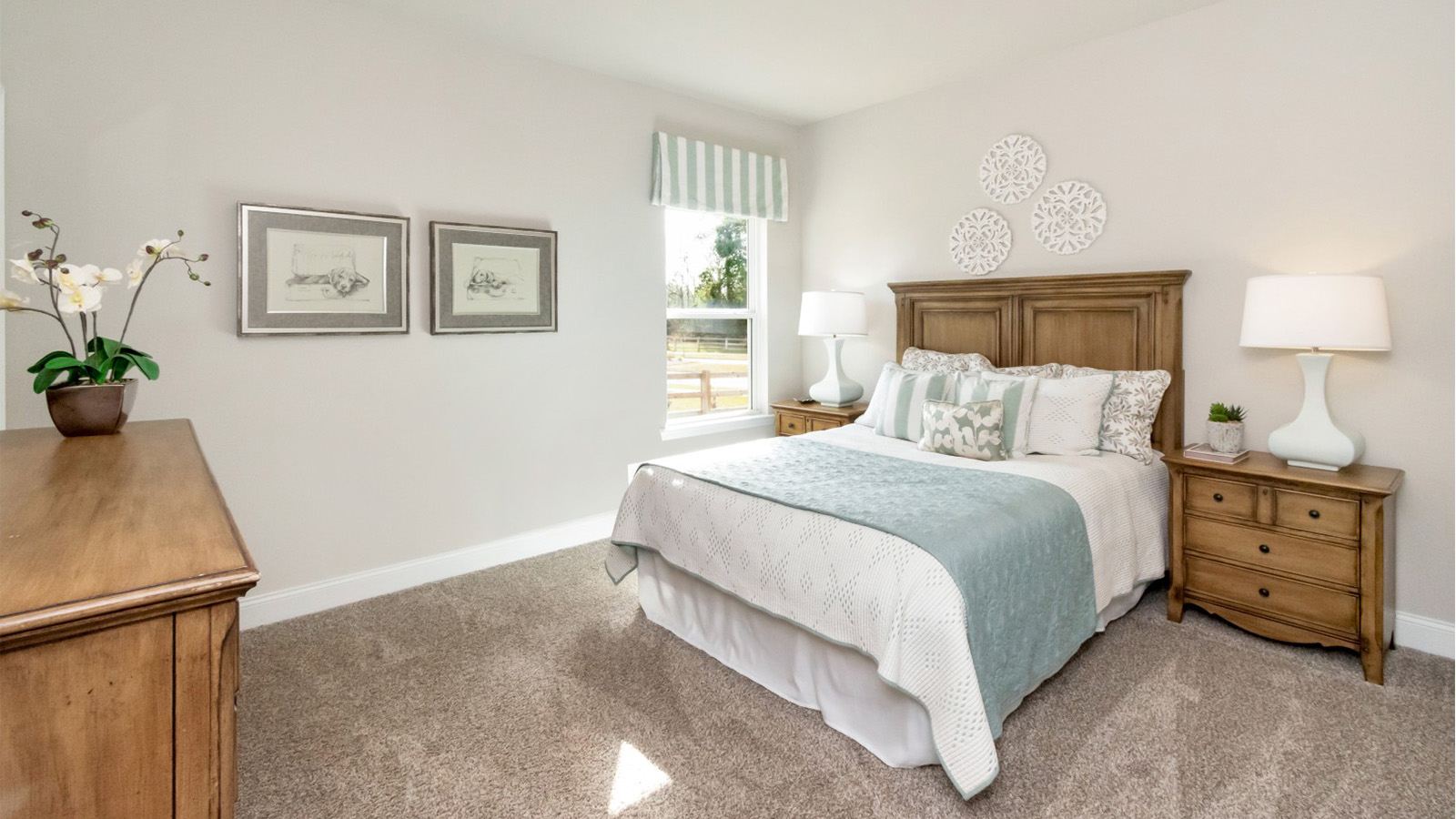 Wake up in a bright and spacious bedroom with views of South Mississippi sunlight.