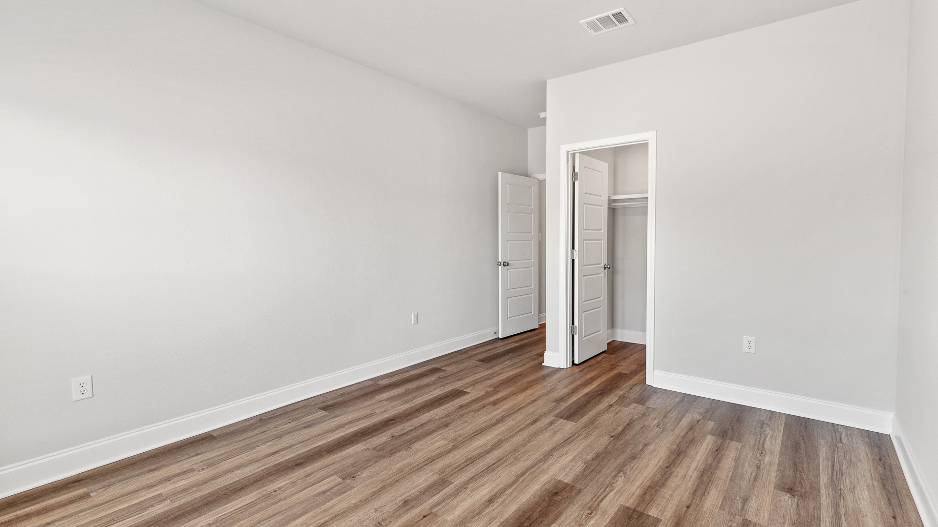 Primary bedroom in a new construction home.