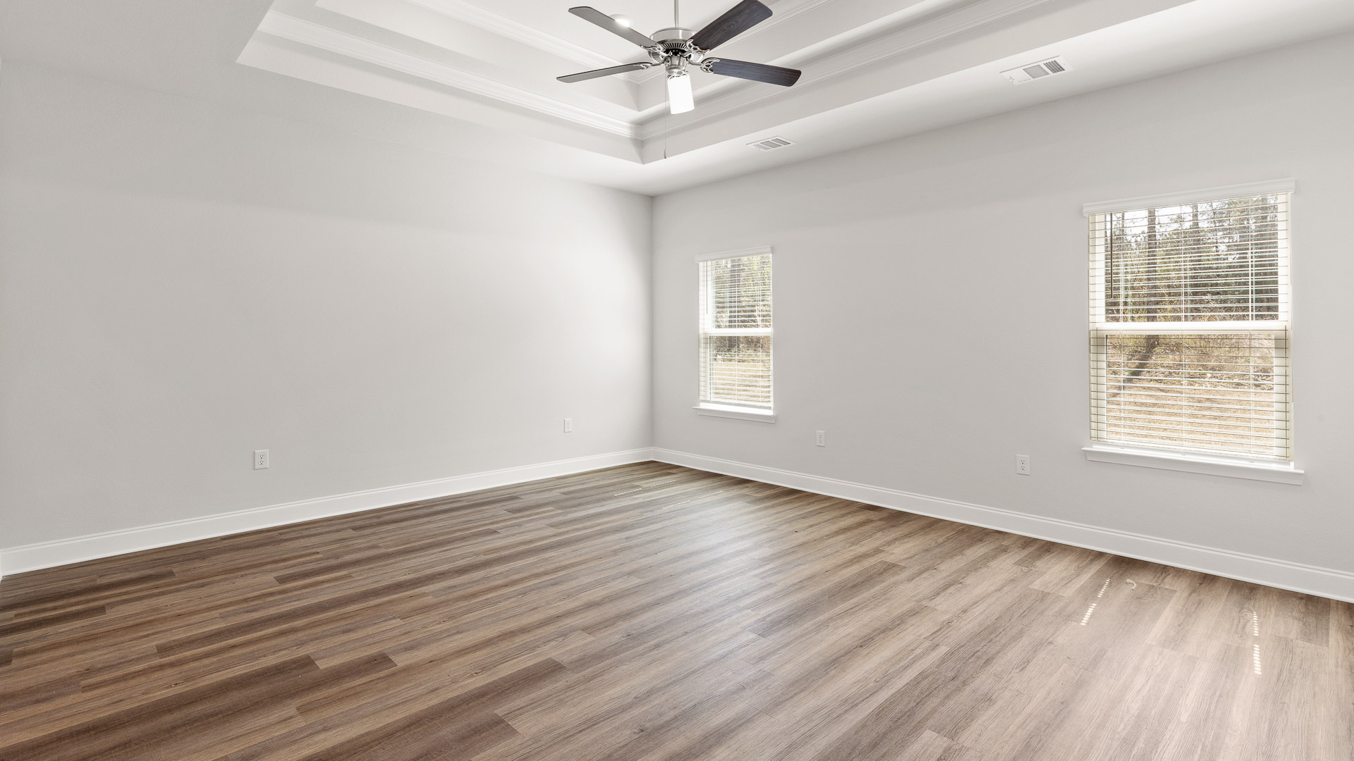 Primary bedroom in a new construction home.