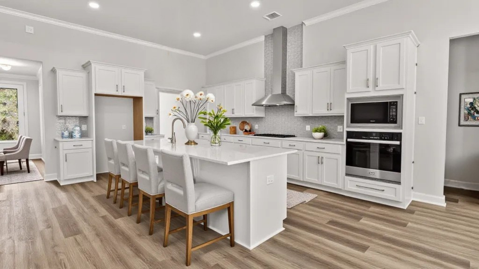 Kitchen island in a new house with quartz countertops.