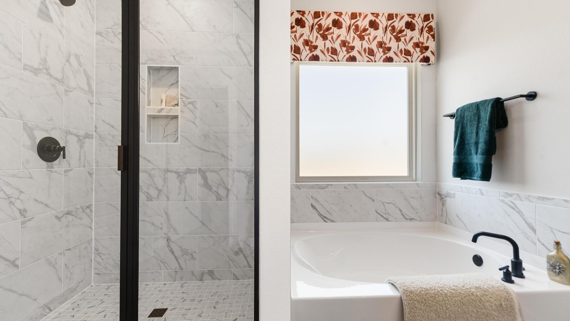 Primary bathroom with shower and tub