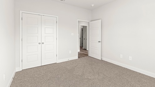 Spacious bedroom inside the Kaden